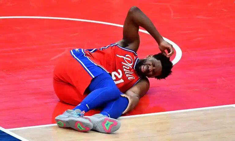 Joel Embiid injures knee in return game, Lakers rally against Pacers