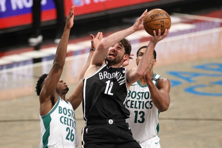 Nets hold on to edge Celtics and regain first place in East