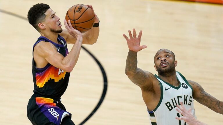 Attacking Booker lifts Suns within two wins of NBA title