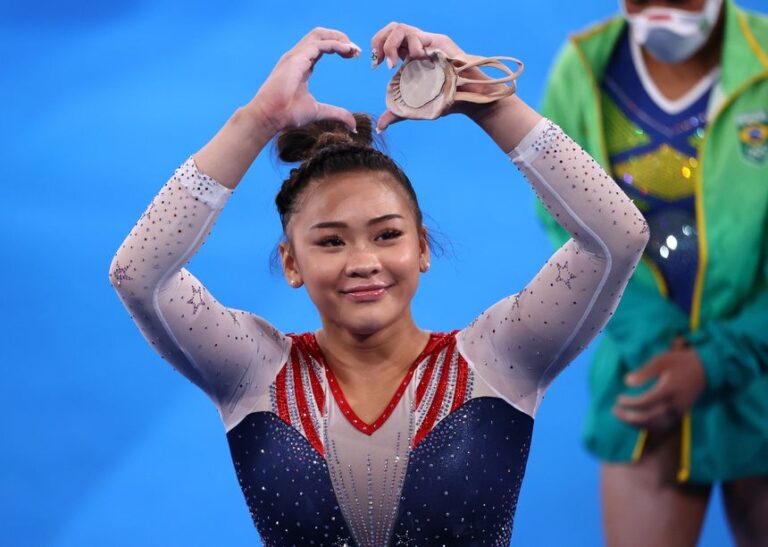 USA’s Sunisa Lee wins Olympic all-around gold as Biles cheers her on