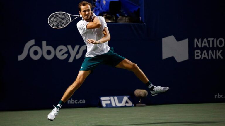 Medvedev dominates Isner to face Opelka for Toronto title