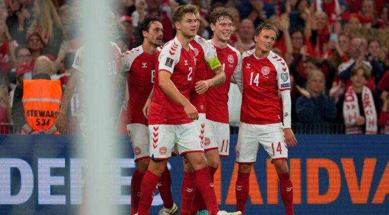 Denmark book World Cup ticket as England are held
