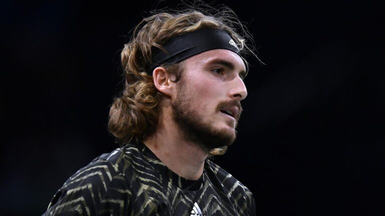 Tsitsipas retires with arm injury as seeds fail in Paris