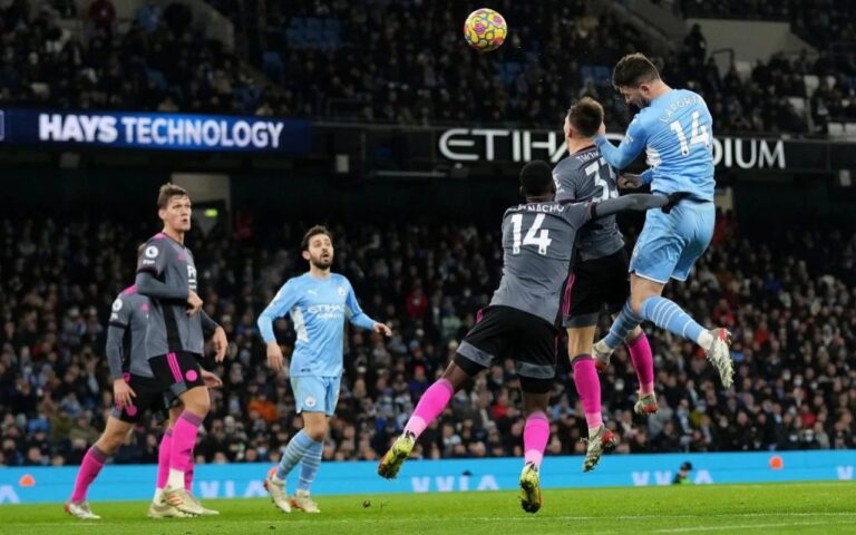 Leaders Man City hit six after Leicester scare