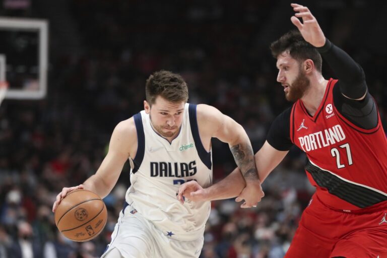 Doncic’s triple-double helps Dallas down Portland 132-112